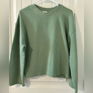 green sweater